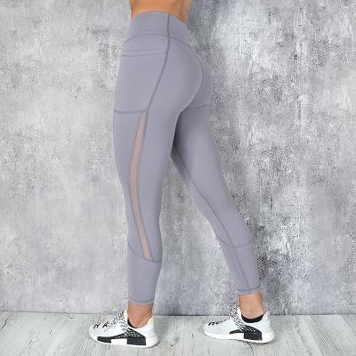 China Sexy 2021 Ladies Mesh Pocket High Waist Yoga Jogger Pants Sports Fitness Gym Gaiters Breathable Outdoor Women Wear for sale