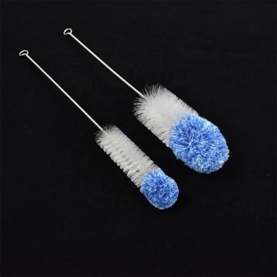 China Long Lasting Handle Straw Baby Bottle Brush With Nipple Remover for sale