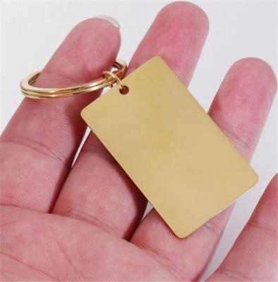 China Metal Personalized Simple Geometric Rectangular Shiny Laser Engraving Tag Pendant Stainless Steel Key Chain for sale