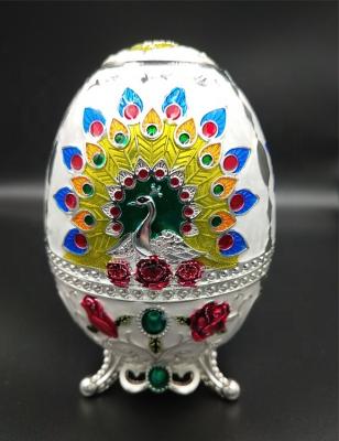 China Hot Sale Faberge Egg Peacock Zinc Alloy Rose Silver Plated Metal Toothpick Holer Automatic Storage Box Viable for sale