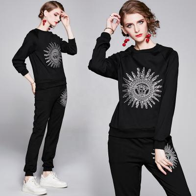 China Anti-pilling Customized Black Custom Thin Sequins High End Embroidered Round Neck Sport Jogging Suits Women 2 Pieces for sale