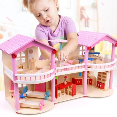 China Girls House Big Size Wooden DIY Handmade Dollhouse Kids Pink Wooden Doll House for sale