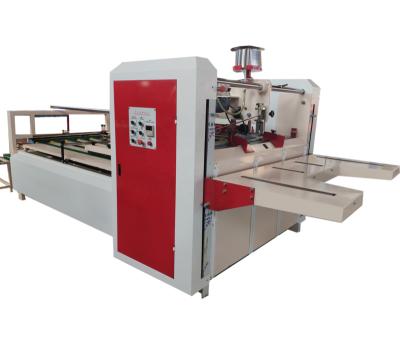 China manual food dongheng folding machine automatic gluing machine gluing press for sale