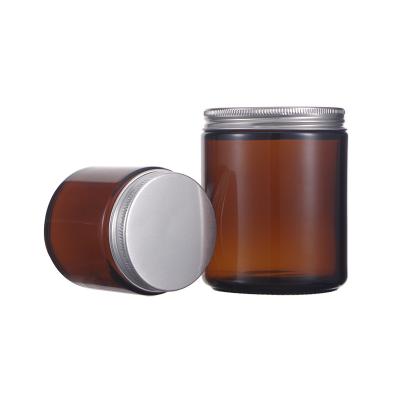 China 100g 250g Brown Containers Amber Glass Candle Jar Face Skin Cream Luxury Cosmetic Jar With Metal Aluminum Silver Top for sale