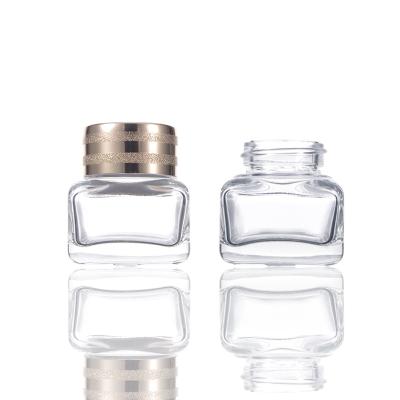 China 15g Small Square Cosmetic Luxury Empty Transparent Clear Cream Jars Glass Mini Cosmetic Jar With Gold Glass Cap for sale