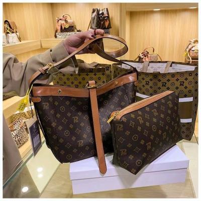 China Moisture monitoring 2022 fashion designer folded handbags famous brands handbags for women luxury for sale