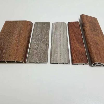 China Traditional T-Moulding Concave Line Quarter End-Cap Carpet Reducer Round Stair Sniffing Skirting Board Vinyl SPC Flooring Accessories for sale