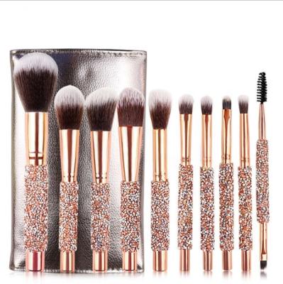 China Angular Blush Rose Handle 10pcs Diamond Base Gold Wood Crystal Brush Set Customization With PU Bag Makeup Brushes for sale