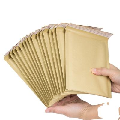 China Hot Selling Express Recycled Brown Kraft Paper Bubble Bag Mailers for sale