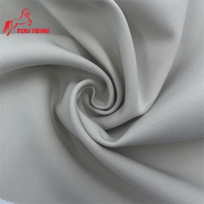 China 75Dx150D 4-Way 295GSM Stiff And Crisp Double Layer Anti-Static Winkle Free Woven Polyester Spandex Fabric Twill for sale