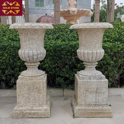 China Modern Outdoor Garden Decorative Hand Carved Natural Stone Urn Planter For Sale for sale