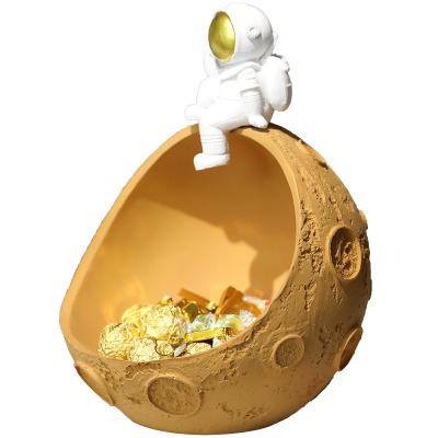 China Durable Nordic Creative Desk Key Desktop Corridor Astronaut Home Ornaments Wine Cabinet Fruit Dish Soft Decorative Astronaut Storage Box for sale