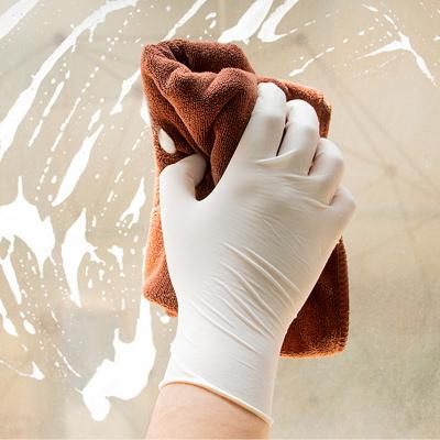 China White Disposable Latex Gloves Lightly Powdered Rubber Cleaning Gloves 100 Pcs/Box for sale