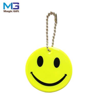 China New Design Smile Face PVC Reflector Safety Untearable Key Chain For Bag for sale