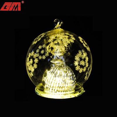 China 2021 Wedding and Festival Decoration New Product Christmas Ball Hanging Snow Glass Man Inside Glass Ball With Led Light 120MM for sale