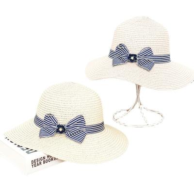 China Folding Straw Hat Women Summer Ladies Sun Striped Outdoor Bowknot Beach Tourist Hat for sale