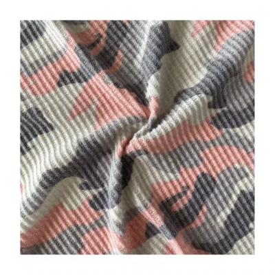 China High quality brushed waffle print knit fabric 63%polyester 33%rayon 4%span viscous T/R/SP with brushed for women garment for sale