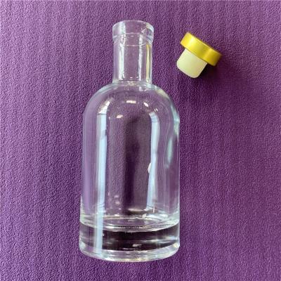 China 200ml liquor liquor bottle, clear glass bottle with synthetic cork on top of the t for sale