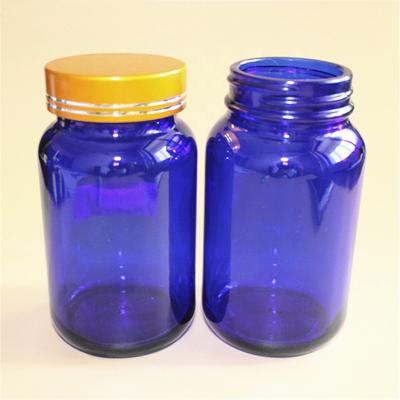 China Pharmaceutical Pill Bottle Cobalt Blue Container Medicine Drug Vitamin Empty Glass Capsule Tops Cream Cosmetic for sale