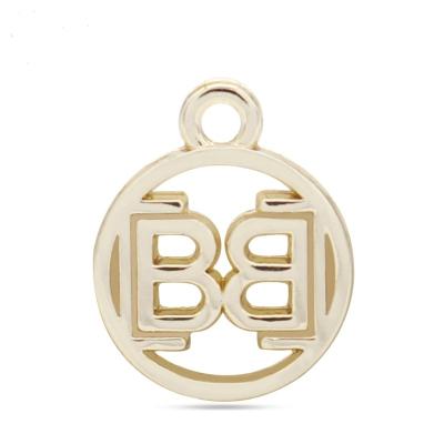 China Hollow Zinc Alloy Letter And Metal Clothes Handbag Logo Plate Tags Pendant Decorations for sale