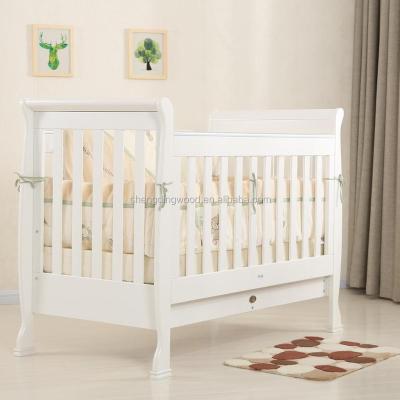 China New Zealand Pine Solid Wood Solid Wood Baby Crib / Baby Hutch With Storage Drawer for sale