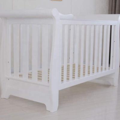 China 2021 Custom Solid Wood Sleigh Cradle Bed Traditional Nursery Furniture for sale