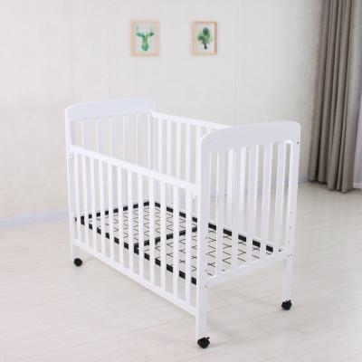 China Wooden Materials Baby Crib Multifunctional Solid Wood Portable Promotion for sale