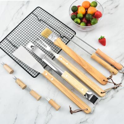 China Stainless Steel Stainless Steel Grill Set Bag Wood BBQ Tool Kit Handle BBQ Combination Tool for sale