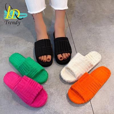 China Fashion Trend Wool Thick Unique Warm Slippers For Women Fashion Hot Sale New Embossed Towel Cotton Slippers High Quality Women Shoes for sale