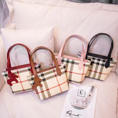 China Motion Detection Pu Fashion Zip Plaid Hand-held Coin Purse Korean New Ladies' Collection Handbag Ladies Bag Geometric Printing for sale