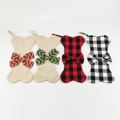 China Wholesale Cotton Christmas Ornament Gift Bag Pet Christmas Stocking Bone Shape Jute Mixed Bunch and Jute Nonwoven Fabric Can Be Customized for sale