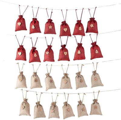 China Jute Advent Calendar 24 Bags With Numbers DIY Christmas Calendar Fabric Gift Bag for sale