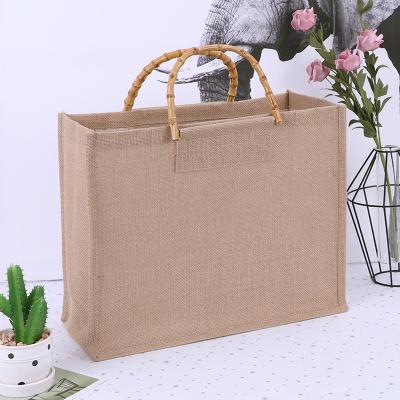 China Normcore/minimalist customized natural reusable jute shopping bag ladies shopping bag environmental protection jute packaging wholesa bag for sale