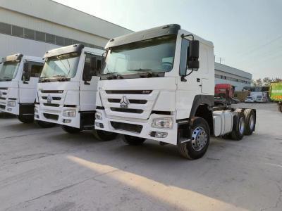 China Combustible mecánico diésel blanco Sinotruk HOWO 6*4 Camión tractor caja de cambios manual en venta