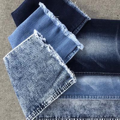 China 11 .7Oz High Stretch Mercerizing Fabric Breathable Spandex Jeans Cotton Denim Fabric for sale