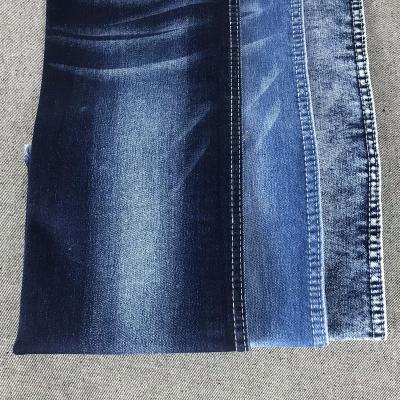 China Breathable 12.4oz Cotton Spandex Denim Fabric Warp Lightweight Stretch Jeans Fabric for sale