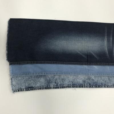 China 7.6oz Denim Fabric Soft Hand Knitted Breathable Style Feel With High Stretch Jeans Fabric for sale