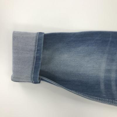 China Breathable 11.5oz Twill Denim Fabric Cross Hatch Wick Broken Jeans Cloth With Slight Stretch for sale