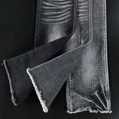 China Breathable Cotton 20% 78% Weight 11.1 Ounce 78% Polyester 2%Spandex Jeans Fabric Light Medium Streak for sale