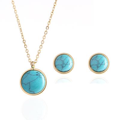 China Skyline Unisex Gold Plated Round Stainless Steel Turquoise Howlite Stone Necklace Earrings Jewelry Set for sale