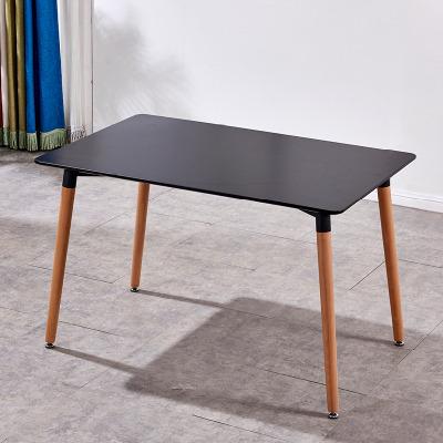 China (Other) Adjustable Modern Nordic Rectangular Minimalist Dining Table Black MDF Top Table With Wooden Legs for sale