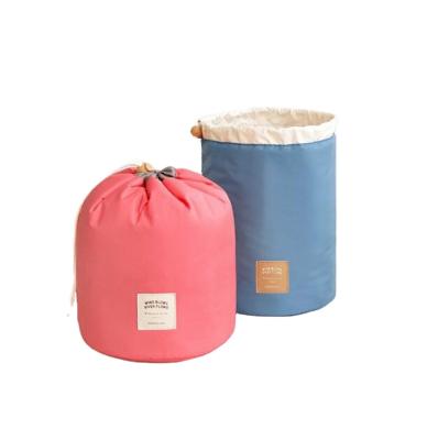 China Eco-friendly Large Polyester Round Travel Cosmetic Drawstring Bag Eco-Friendly Barrel Cosmetic Bag for sale