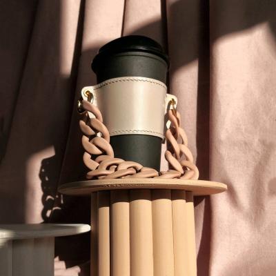 China Viable Wholesale Leather Reusable Chain Portable Cup Cover Handmade Cup Holder Cup Sleeve for sale