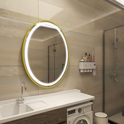 China Luminous espejo magnifying light led bano gold frame oval led bathroom mirror for decorative bath room for sale