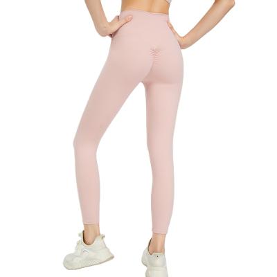 China High-waist European and American bare stretch hip fitness pants peach quick-drying breathable tight-fitting yoga pants for sale