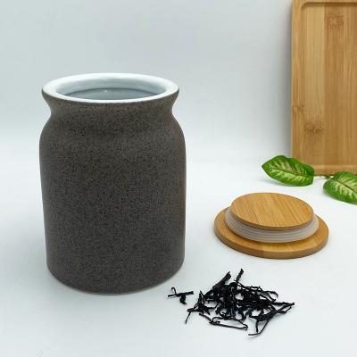 China 15oz Unique Sustainable Ceramic Luxury Dry Food London Style Airtight Canister for Kitchen with Bamboo Lid for sale