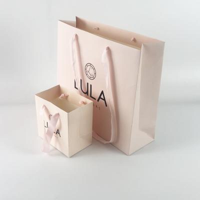 China Recyclable High End Custom Shopping Paper Bag With Ribbon Handle for sale