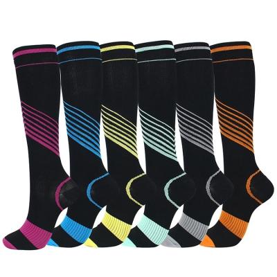 China Breathable Athletic Calf Sports Compression Socks Men Women Basketball Running Socks for sale