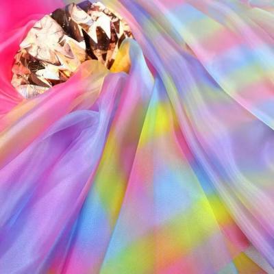 China Top Selling Best Shrink-Resistant Light Texture 100% Polyester Tulle Fabric Gradient Rainbow Organza Fabric For Clothing for sale