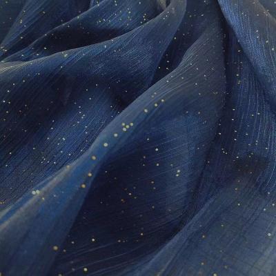 China Shrink-Resistant 100% Polyester Crinkle Glitter Cationic Dusting Powder Organza Fabric For Wedding Decor for sale